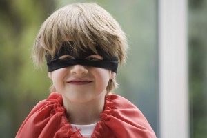 Boy dressed up as superhero